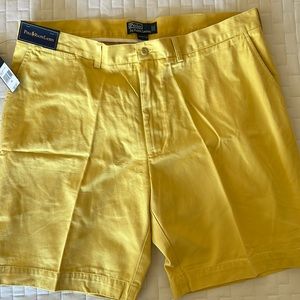 Polo Ralph Lauren men’s flat front shorts in yellow.
